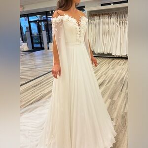 Wedding dress with flowy sleeves & flowers